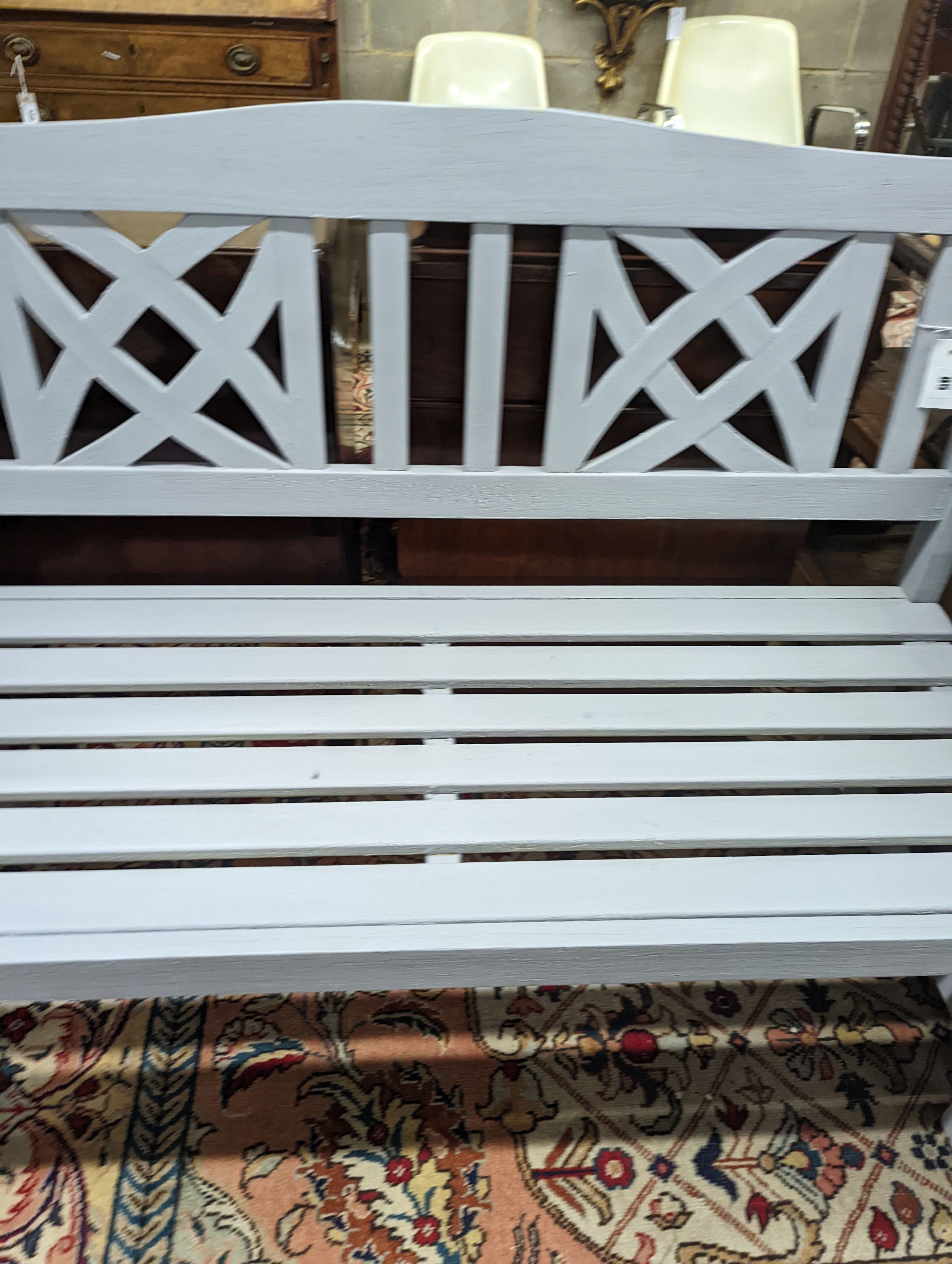 A painted teak garden bench, length 120cm, depth 54cm, height 90cm